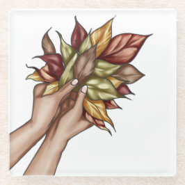 PAAR HANDEN MET HERFSTBLADEREN GLAZEN ONDERZETTER