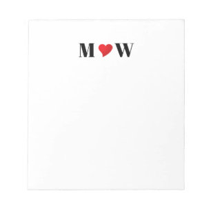 Paar initialen A houdt B rood hart aan Notitieblok