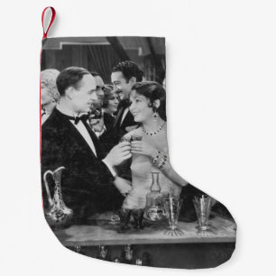 Paar met drink in drukke bar kleine kerstsok