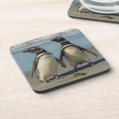 Paar pinguïns op het strand bier onderzetter (Linkerzijde)