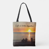 Paar zit op strand op de Canvas tas (Achterkant)