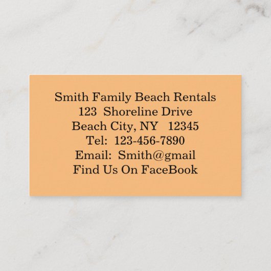 Paar zit op strand op het Visitekaartje (Achterkant)