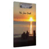 Paar zittend op Florida strand klembord (Rechts)