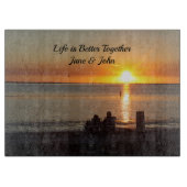 Paar zittend op Florida strand snijplank (Voorkant)