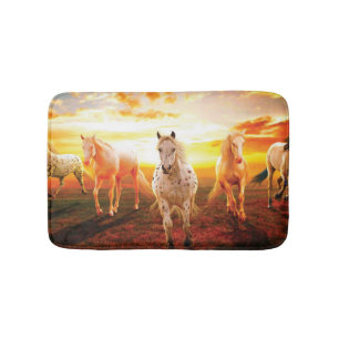 Paarden bij zonsondergang badmat