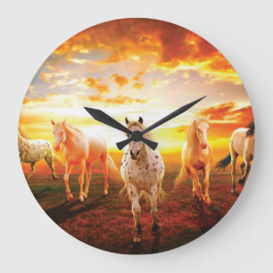 Paarden bij zonsondergang grote klok
