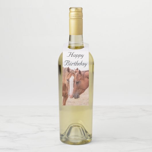 Paarden die in een weiland snuiven flessenhanger (Op fles)