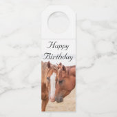 Paarden die in een weiland snuiven flessenhanger (Voorkant)