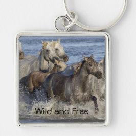 Paarden die in het water galmen sleutelhanger