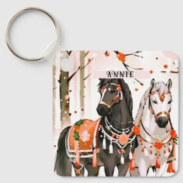 Paarden in een rood bos aangepaste naam sleutelhanger
