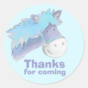 Paarden/pony die blauw zijn dank aan stickers van