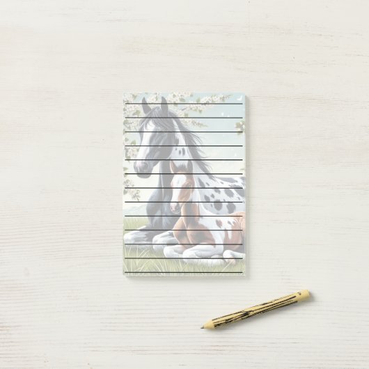 Paarden rusten tussen levendige bloemen en groen post-it® notes (Op bureau)