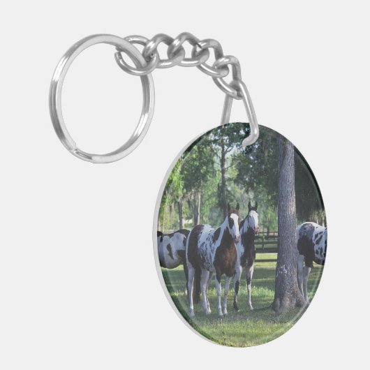 Paarden verven in de bomen sleutelhanger (Voorkant Links)