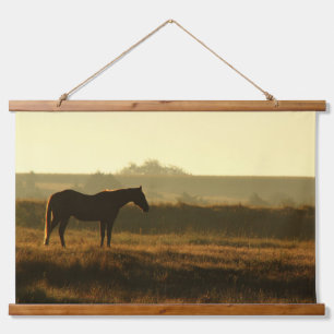Paardensilhouet in de ochtendzon. hangend wandkleed