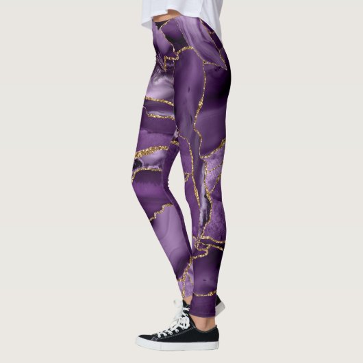 Paars en goudglitteraglaat leggings (Links)