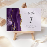 Paars Gold Agate Lavender Wedding Kaart<br><div class="desc">De linkerrand van deze elegante moderne trouwtafel-nummerkaart is voorzien van een paarse waterverf-agatgrens die is getrimd met faux goudglitter. De aanpasbare tekst combineert het handschrift van houtskool grijs,  en cursieve en copperplate doopvonten op een lavenderachtergrond.</div>