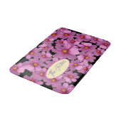 Paars kosmos-ventilatorontwerp op een zwarte achte badmat (Gekanteld)