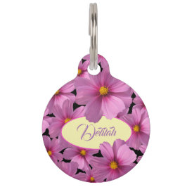 Paars kosmos-ventilatorontwerp op een zwarte achte huisdierpenning