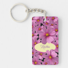 Paars kosmos-ventilatorontwerp op een zwarte achte sleutelhanger