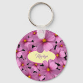 Paars kosmos-ventilatorontwerp op een zwarte achte sleutelhanger (Voorkant)