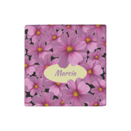 Paars kosmos-ventilatorontwerp op een zwarte achte stenen magneet