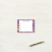 Paars met kleurrijke Stippen Post it Note (Op bureau)