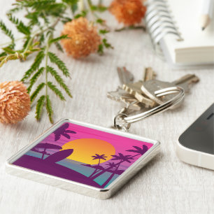 Paars strand met zonsonderend surf sleutelhanger