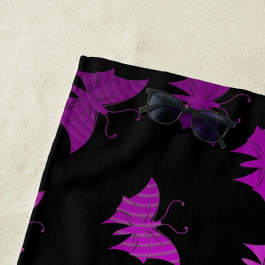 paars, zwart strandlaken (In situ)