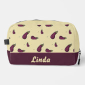 Paarse aubergines op crèmekleur toilettasje (Voorkant)