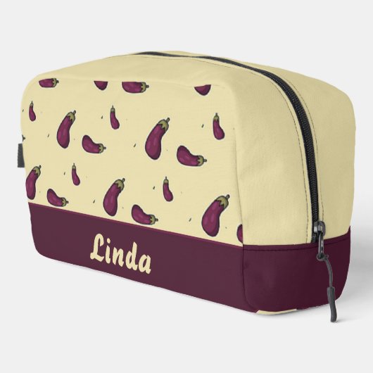 Paarse aubergines op crèmekleur toilettasje (Rechterhoek)