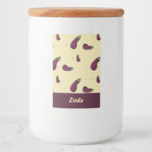 Paarse aubergines op geel voedselcontainer etiket (Voorkant)