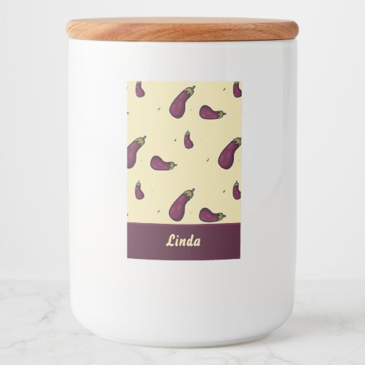 Paarse aubergines op geel voedselcontainer etiket (Voorkant)