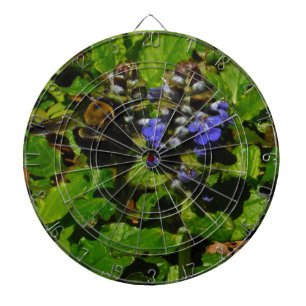 Paarse bijenbalm en roodbaars dartbord