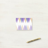 Paarse, blauwe en gele driehoeken post-it® notes (Op bureau)
