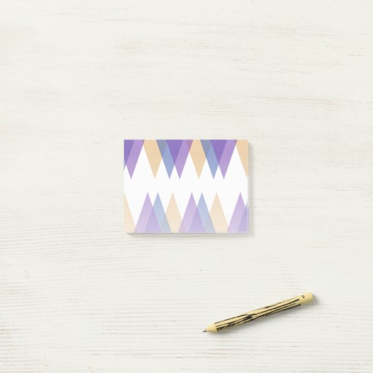 Paarse, blauwe en gele driehoeken post-it® notes (Op bureau)