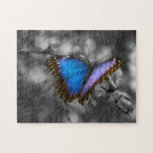 Paarse blauwe vlinder legpuzzel