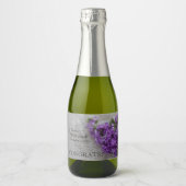 Paarse bloemen op de plaats sparkling wijnetiket (Voorkant)