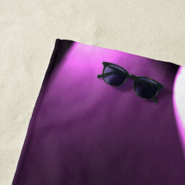 Paarse draaiende lichten strandlaken