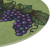 Paarse druiven, liefst ronddraaiend, glazen snijvl snijplank (Hoek)