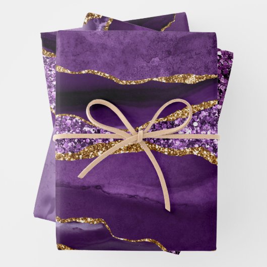 Paarse en goudfaux-glitteragaat inpakpapier vel (In situ)