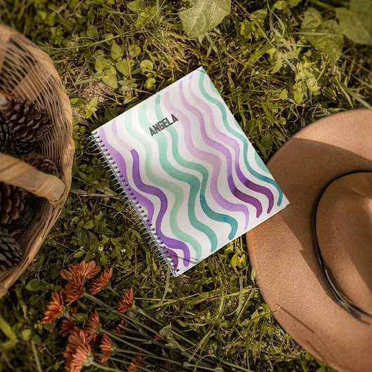 Paarse en groene waterverf notitieboek