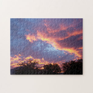 Paarse en Oranje wolken op zonsondergang Legpuzzel
