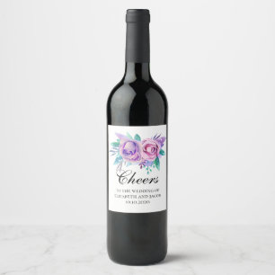 Paarse en roze bloemen. Bloemstuk proost bruiloft Wijn Etiket