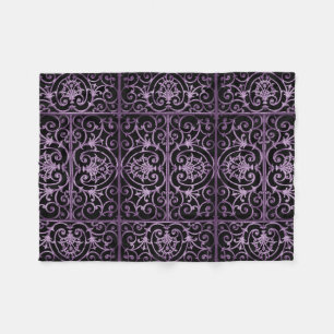 Paarse en zwarte rollen fleece deken