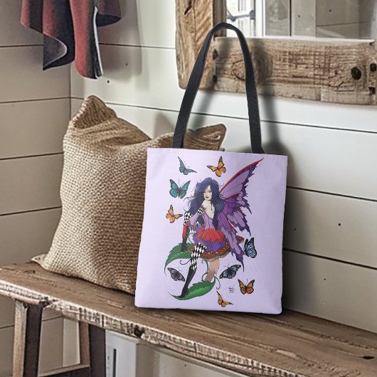 Paarse fee paddenstoel vlinders tote bag