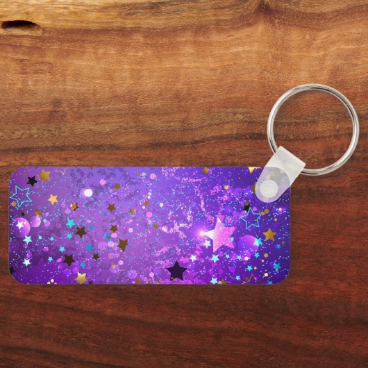 Paarse folieachtergrond met sterren sleutelhanger (Voorkant)