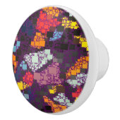 Paarse geometrische schetsen over kleurrijke schou keramische knop (Rechts)