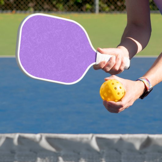 Paarse gestructureerd oppervlak met wervelend patr pickleball paddle (Insitu)
