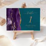 Paarse gouden agaat Blauwgroen bruiloft Kaart<br><div class="desc">De linkerkant van deze elegante moderne bruidstafelnummerkaart is voorzien van een paarse waterverf agaatrand met faux gouden glitter. De aanpasbare tekst combineert goudkleurig handschrift en cursief- en koperplaatlettertypen op een blauwgroen blauwe achtergrond.</div>