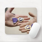 Paarse Heart-ontvangers tonen hun medailles Muismat (Met muis)